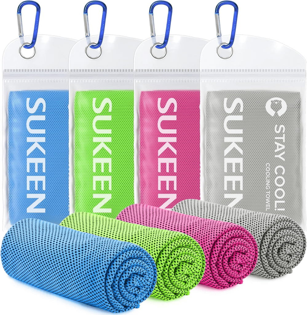 Four rolled cooling towels in blue, green, pink, and gray, each with a matching carrying pouch and blue carabiner clip, labeled "Sukeen.